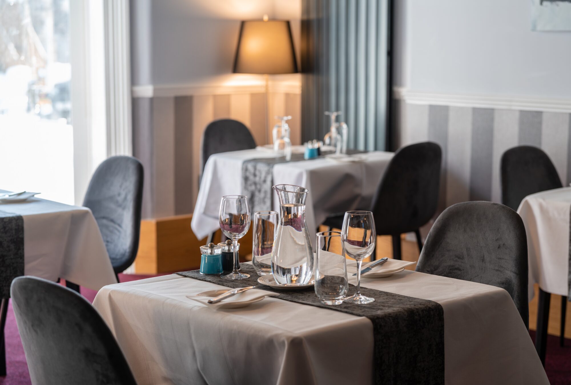 An empty table set for dinner at the Brasserie restaurant at the Carlton Hotel in Ilfracombe