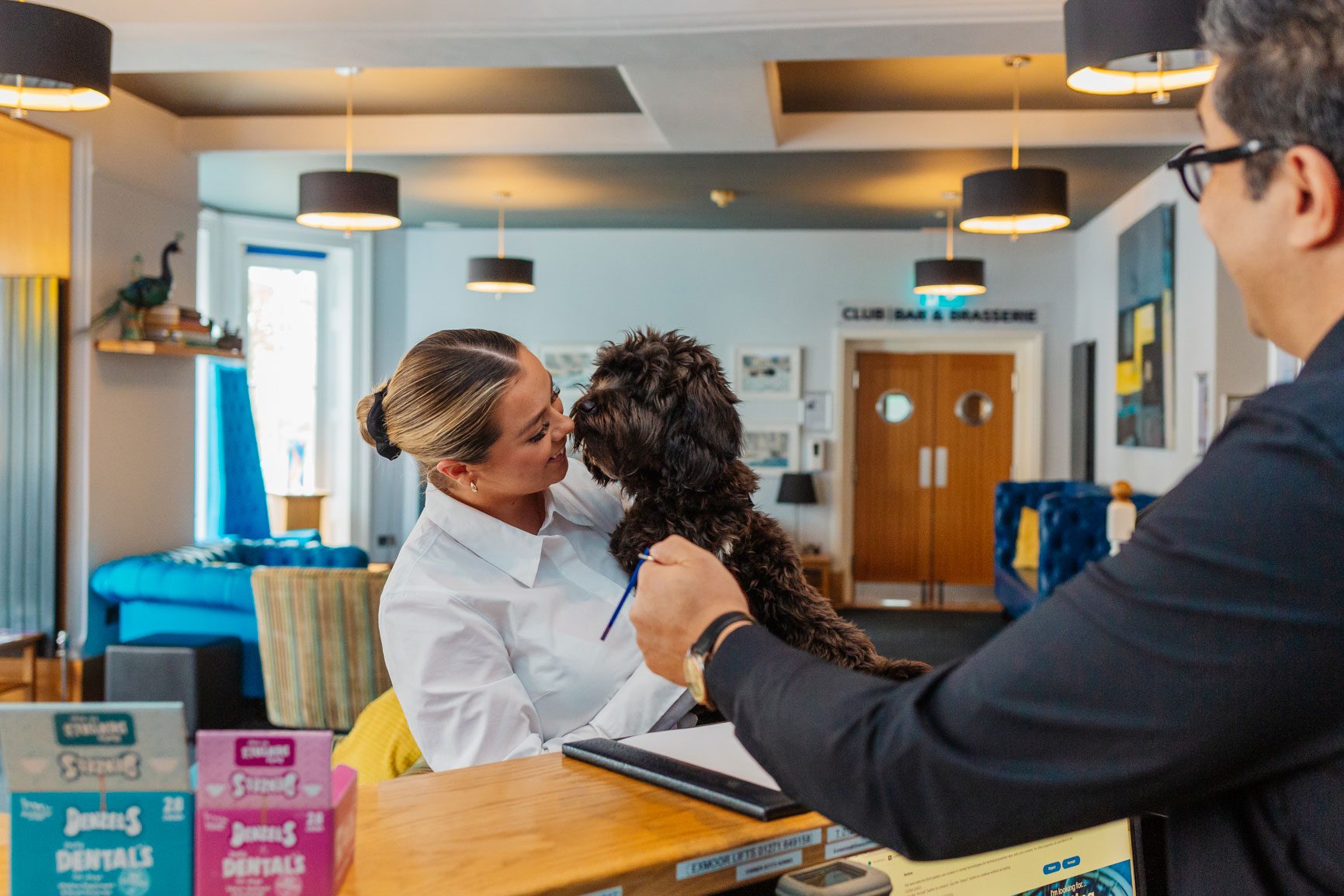 Hotel staff at a dog-friendly hotel in North Devon welcome a dog guest