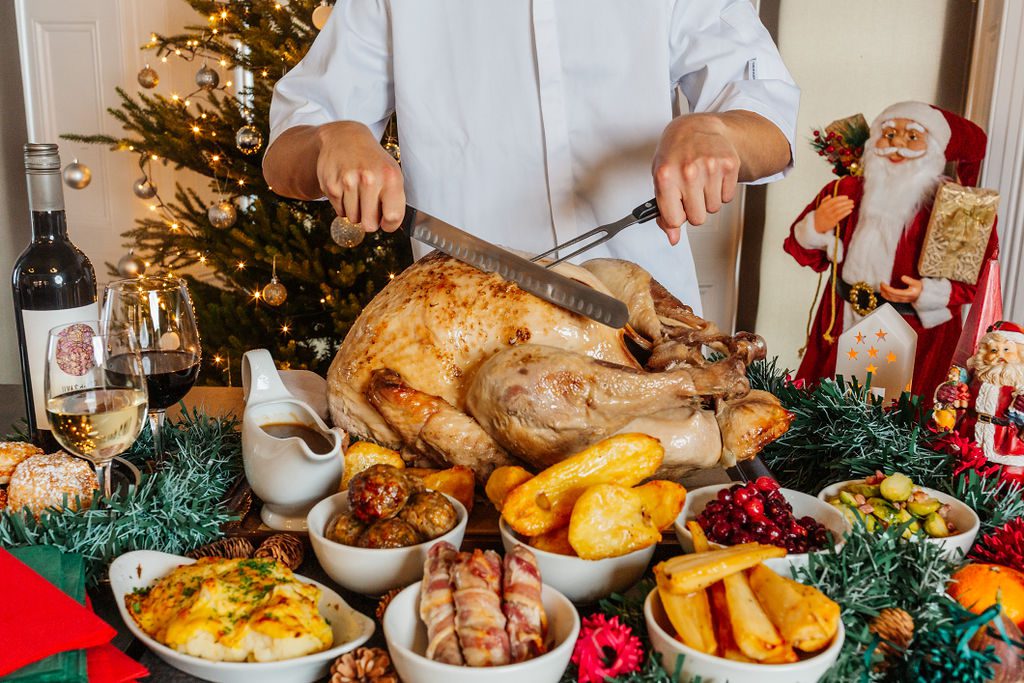 A chef carves a huge turkey for a festive lunch at The Carlton Hotel Christmas party venue in North Devon