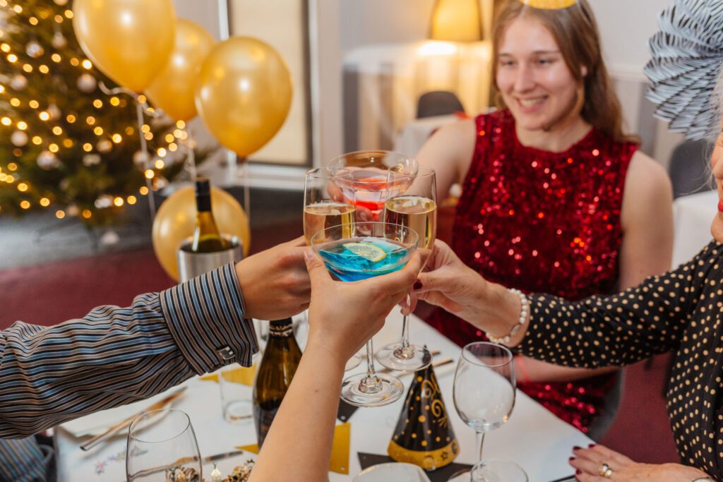 A family enjoy New Years Eve together in a hotel